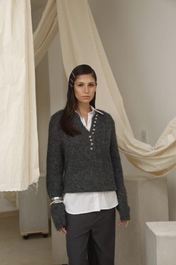 Sweater tejido con lurex.