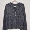 Sweater tejido con lurex.